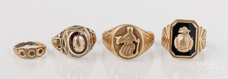 Four 10k gold rings