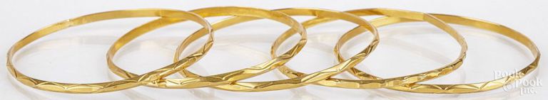 Five 18k yellow gold bangle bracelets