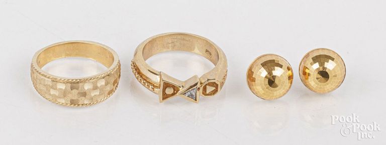 Two 14k yellow gold rings and pair of earrings