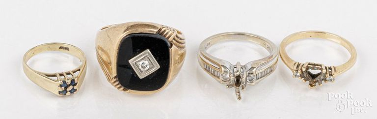 Four 14k gold onyx, sapphire and diamond rings