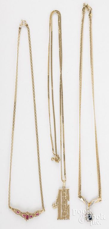 Three 14k yellow gold diamond necklaces