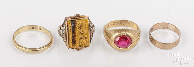 Four 10k gold rings