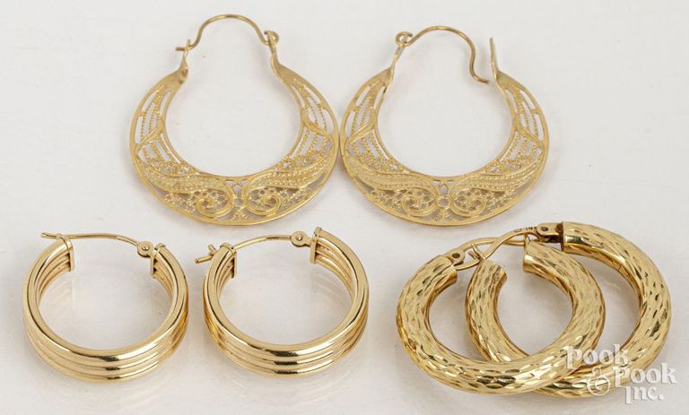 Three pairs of 14k yellow gold earrings