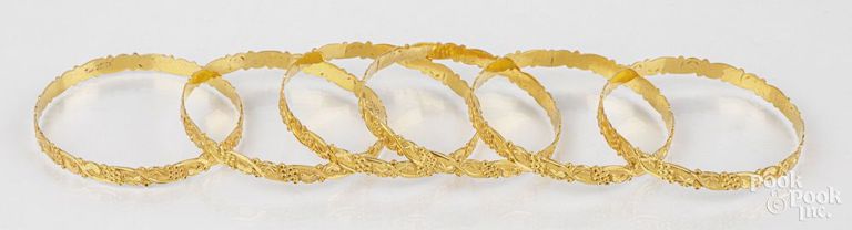 Six 22k yellow gold bangle bracelets