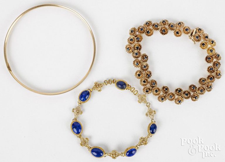 Three 14k yellow gold bracelets