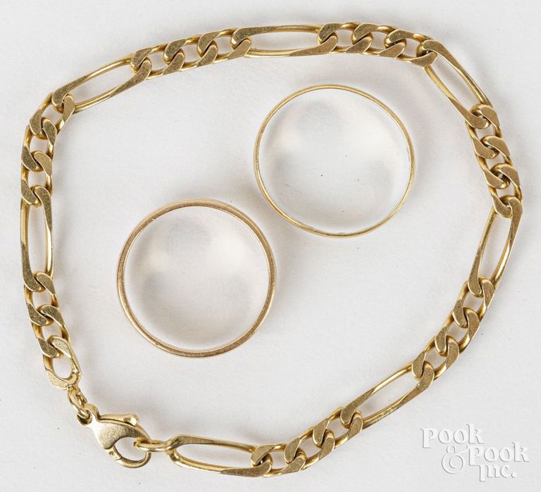 18k yellow gold bracelet and two rings
