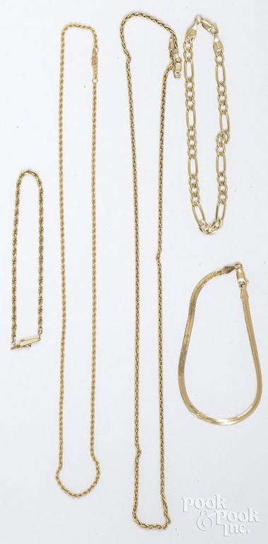 Five 14k gold chains and cameo pendant