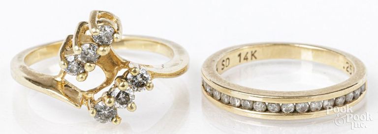 Two 14k yellow gold diamond rings