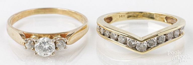 Two 14k yellow gold diamond rings