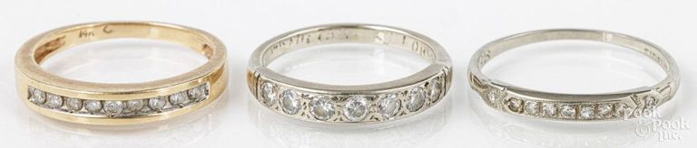 Three gold diamond rings