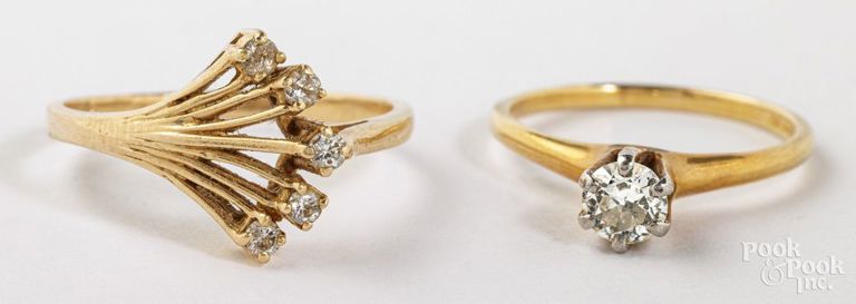 Two 14k yellow gold diamond rings
