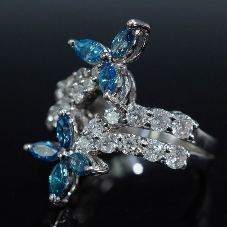 18k Gold Diamond and White Stone Bypass Ring