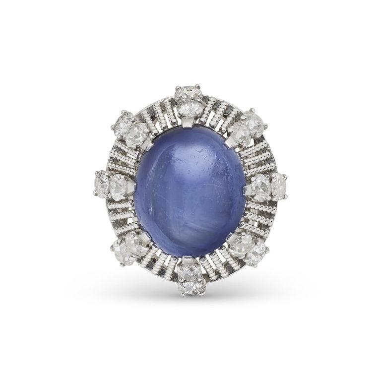 Platinum and 18k Gold Sapphire and Diamond Ring