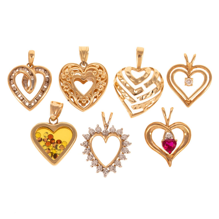 Seven 14k and 10k Gold Heart Pendants