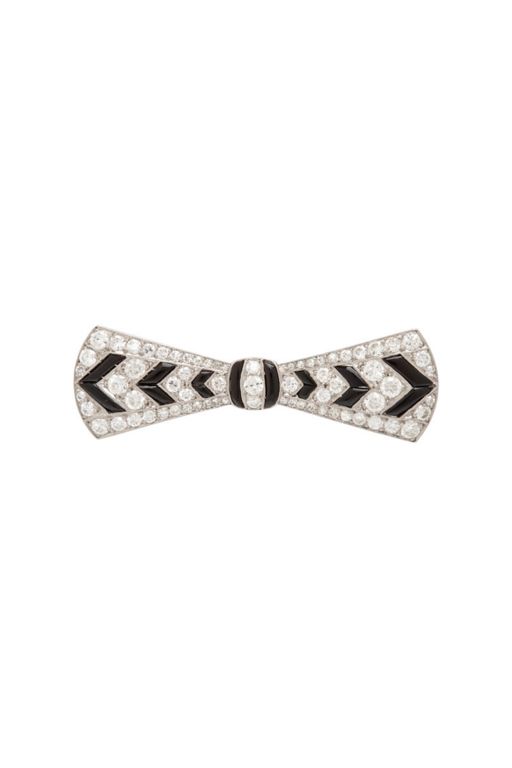 Platinum and 18k Gold Diamond and Onyx Bow Brooch