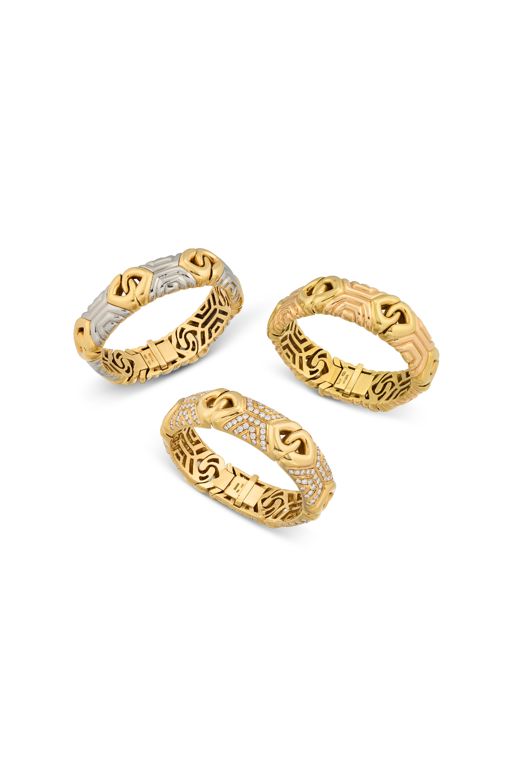 Three Yellow and White Metal Bracelets