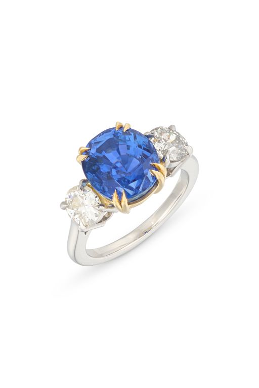 White and Yellow Metal Sapphire and Diamond Ring