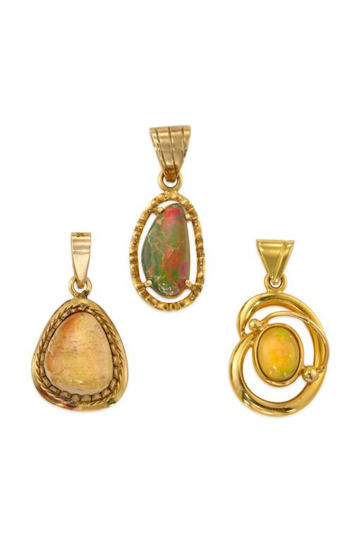 Three Gold Opal and Onyx Pendants