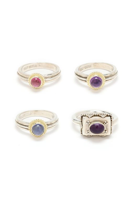 Four Silver and Gem-Set Rings