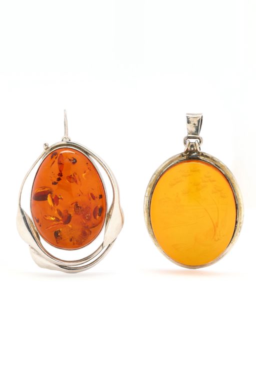 Two Silver and Amber Pendants