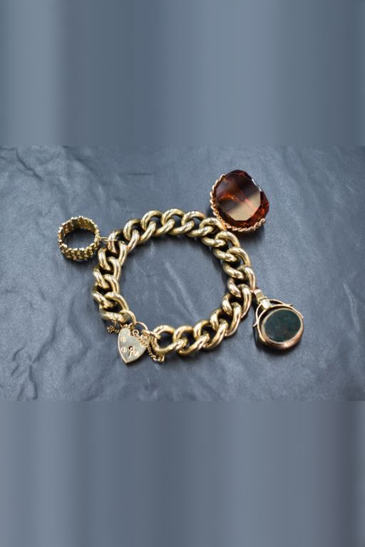 9k Gold Charm Bracelet