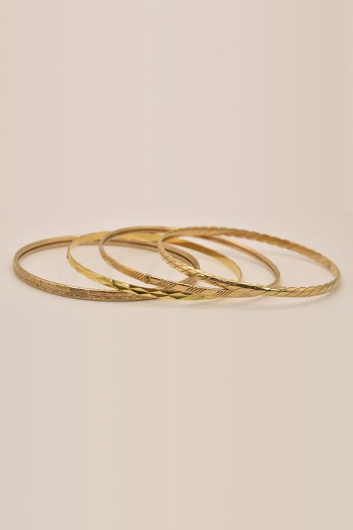 Four 9k Gold Bracelets