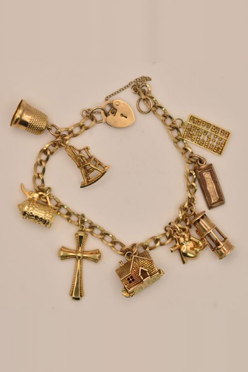 9k Gold Charm Bracelet