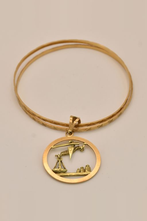 Pair of 18k Gold Bracelets