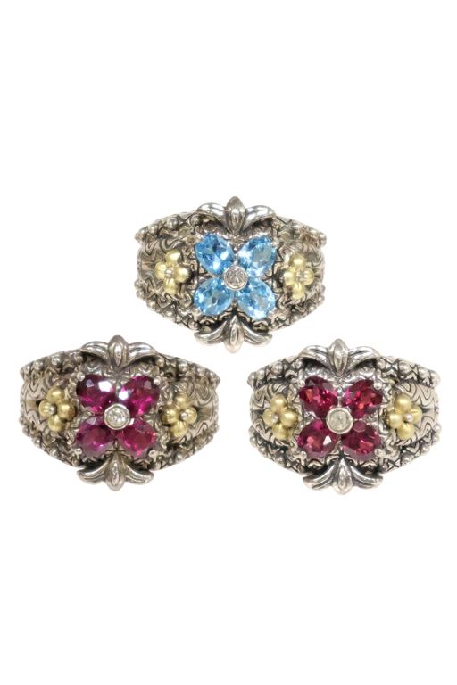 Three Sterling Silver and 18k Gold Rings