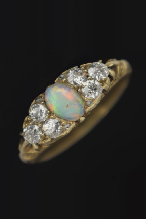 Yellow Metal Opal and Diamond Ring