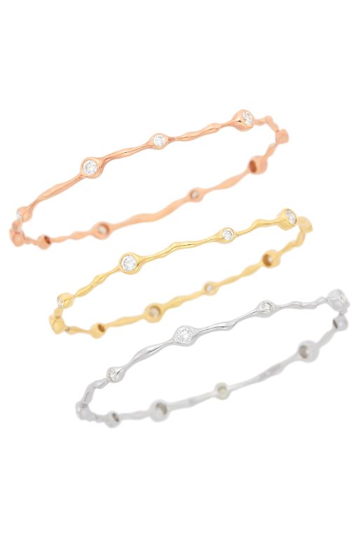 Three 18k Gold Diamond Bracelets