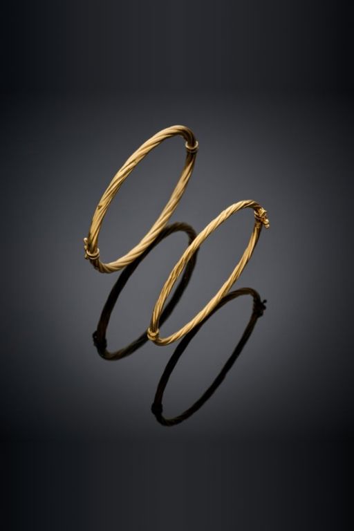 Two 18k Gold Bangle Bracelets