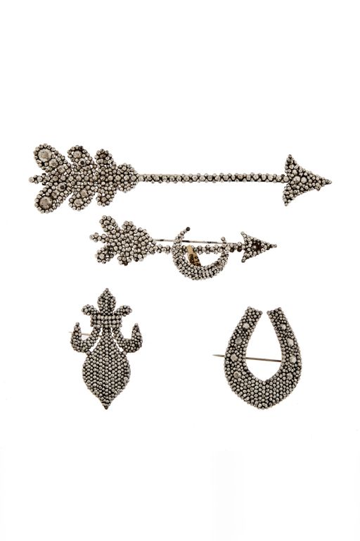 Four Steel Brooches