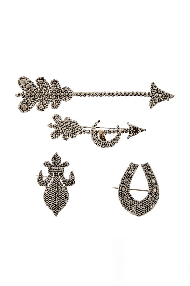 Four Steel Brooches