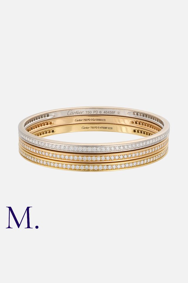 Three 18k Gold Diamond Bangle Bracelets