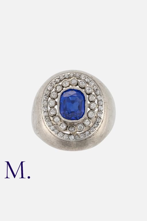 Platinum and Silver Sapphire and Diamond Ring