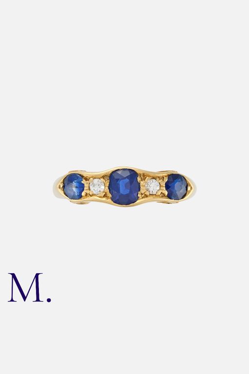 18k Yellow Gold Sapphire and Diamond Ring