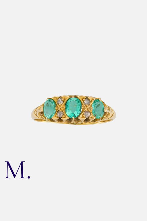18k Yellow Gold Emerald and Diamond Ring