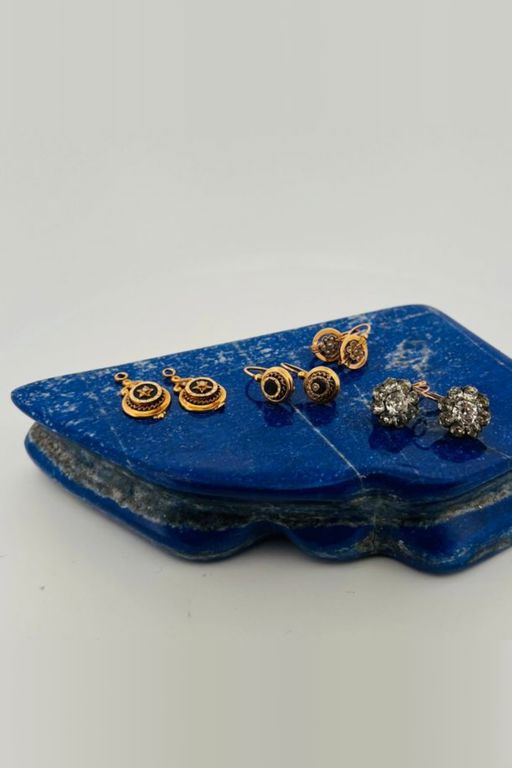 Three Pairs of Gold and Silver Hoop Earrings