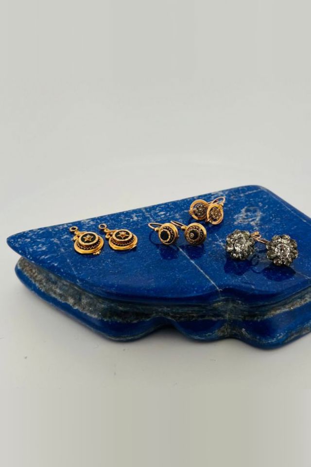 Three Pairs of Gold and Silver Hoop Earrings