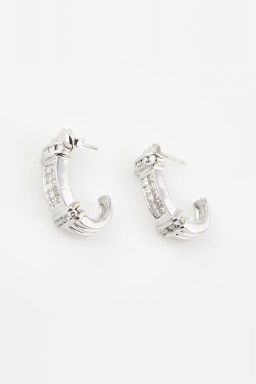 Pair of 14k Gold Diamond Earrings