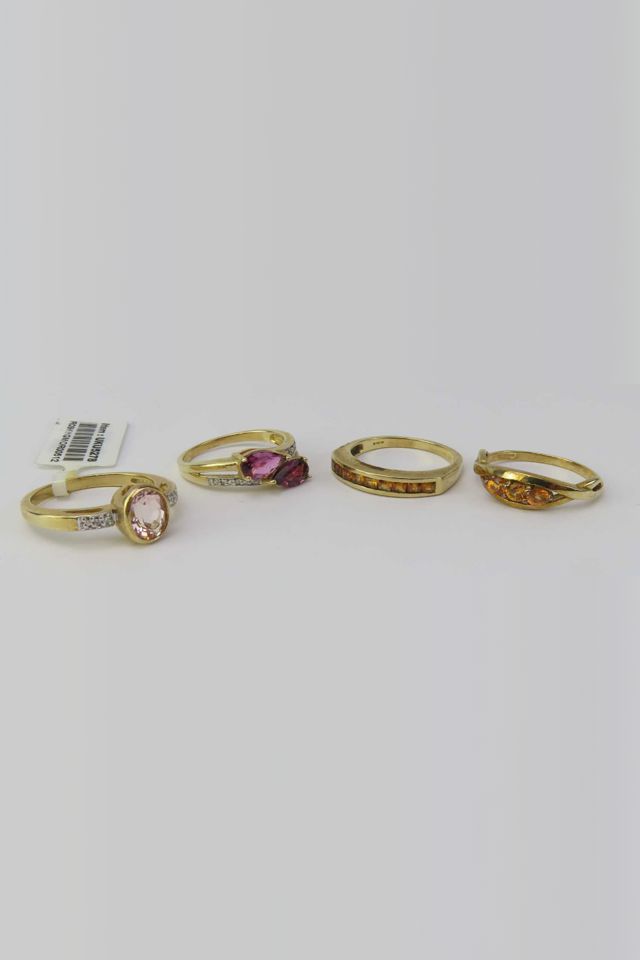 Four 9k Gold Gemstone Ring