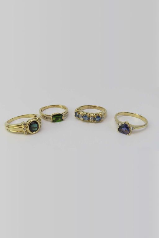 Four 9k Gold Gemstone Rings
