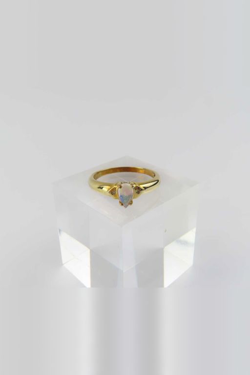 Four 9k and 18k Gold Gemstone Rings