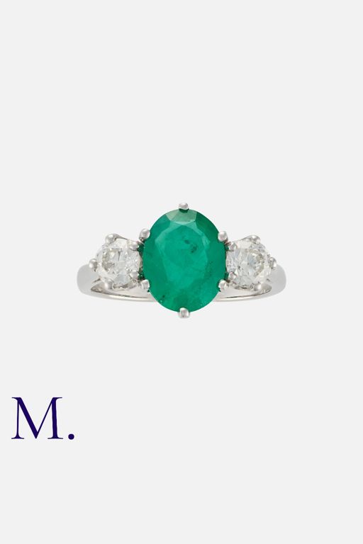 Platinum Emerald and Diamond Three-Stone Ring
