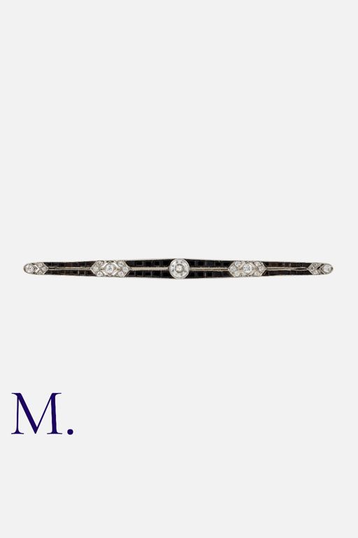 Platinum and 18k Gold Onyx and Diamond Brooch