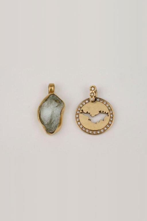 Two Gold Rock Crystal and Diamond Pendants
