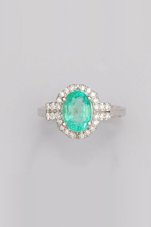 18k White Gold Emerald and Diamond Halo Ring